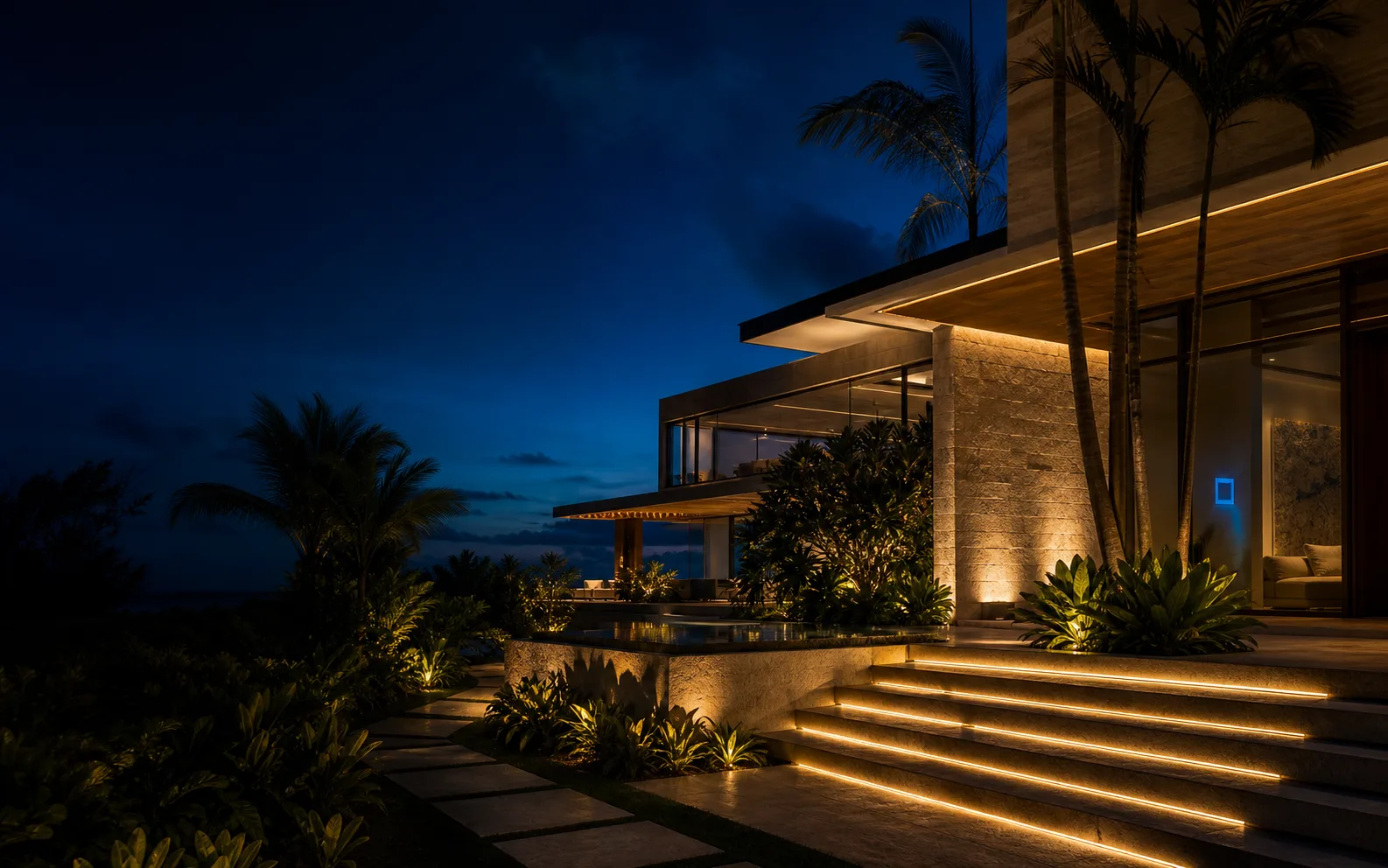 Coastal residence illuminated with layered architectural lighting